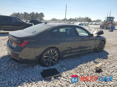 Trzecie zdjęcie samochodu z tyłu: 2022 BMW 740 I VIN:WBA7T2C03NCJ43914 - miniatura