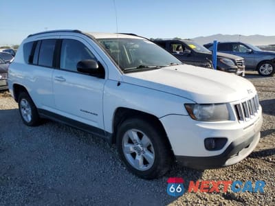 Czwarte zdjęcie samochodu z boku: 2014 JEEP COMPASS SPORT VIN:1C4NJCBA4ED812086 - miniatura