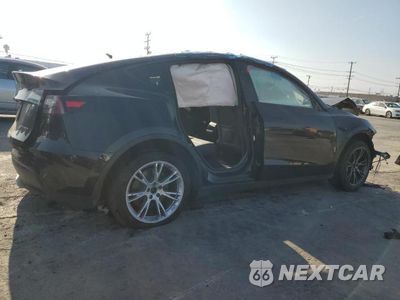 Trzecie zdjęcie samochodu z tyłu: 2024 TESLA Y VIN:7SAYGDEE6RF025545 - miniatura