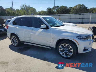 Czwarte zdjęcie samochodu z boku: 2017 BMW X5 XDR40E VIN:5UXKT0C37H0V96322 - miniatura