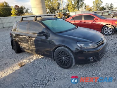 Czwarte zdjęcie samochodu z boku: 2011 VOLKSWAGEN GOLF VIN:WVWDM7AJXBW068229 - miniatura