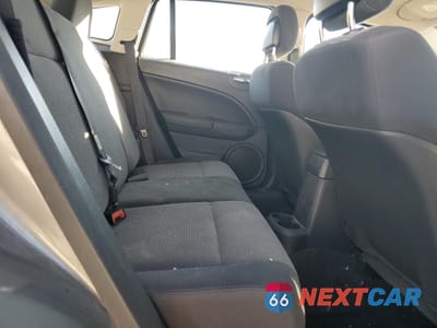 Zdjęcie 10 z 15 samochodu: 2011 DODGE CALIBER MAINSTREET VIN:1B3CB3HA3BD254563 - miniatura