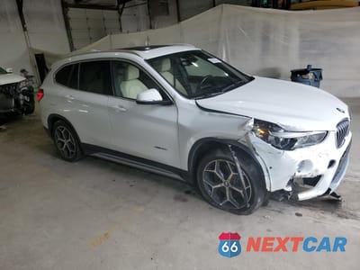 Czwarte zdjęcie samochodu z boku: 2016 BMW X1 XDRIVE28I VIN:WBXHT3C37G5F66189 - miniatura