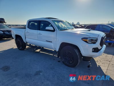 Czwarte zdjęcie samochodu z boku: 2022 TOYOTA TACOMA DOUBLE CAB VIN:3TMAZ5CN6NM188932 - miniatura