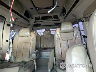Zdjęcie 11 z 14 samochodu: 2004 FORD ECONOLINE E150 VAN VIN:1FDRE14LX4HA54850 - miniatura
