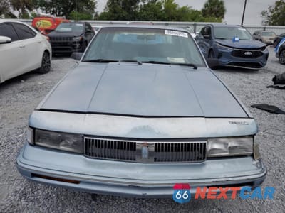 Piąte zdjęcie samochodu w środku: 1994 OLDSMOBILE CUTLASS CIERA S VIN:1G3AG55M2R6400421 - miniatura