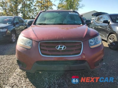 Piąte zdjęcie samochodu w środku: 2011 HYUNDAI SANTA FE GLS VIN:5XYZGDAB5BG069290 - miniatura