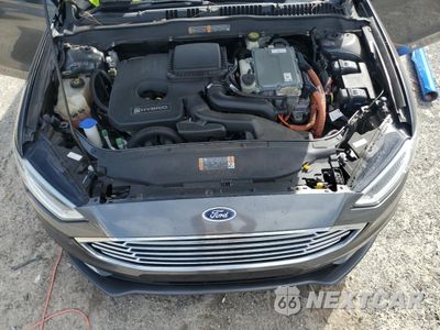 Zdjęcie 11 z 12 samochodu: 2017 FORD FUSION TITANIUM HEV VIN:3FA6P0RU6HR236665 - miniatura