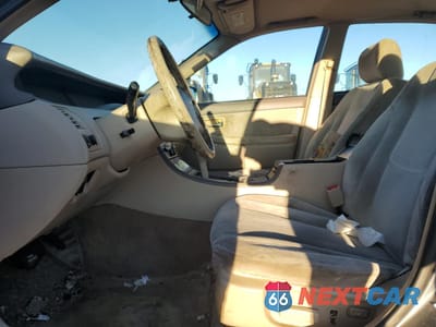 Zdjęcie 7 z 14 samochodu: 2000 TOYOTA AVALON XL VIN:4T1BF28B0YU022010 - miniatura