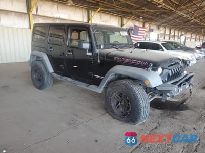Czwarte zdjęcie samochodu z boku: 2012 JEEP WRANGLER UNLIMITED RUBICON VIN:1C4BJWFG4CL103454 - miniatura