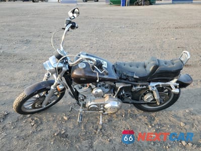 Trzecie zdjęcie samochodu z tyłu: 2002 HARLEY-DAVIDSON XL883 HUGGER VIN:1HD4CEM152K147414 - miniatura