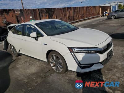 Czwarte zdjęcie samochodu z boku: 2018 HONDA CLARITY TOURING VIN:JHMZC5F34JC008355 - miniatura