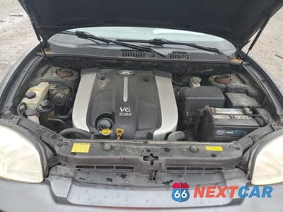 Zdjęcie 12 z 15 samochodu: 2005 HYUNDAI SANTA FE GLS VIN:KM8SC73E55U872430 - miniatura