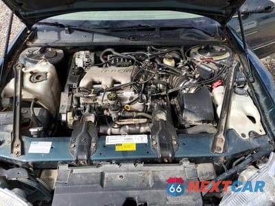 Zdjęcie 11 z 12 samochodu: 2001 CHEVROLET LUMINA VIN:2G1WL52J411298104 - miniatura