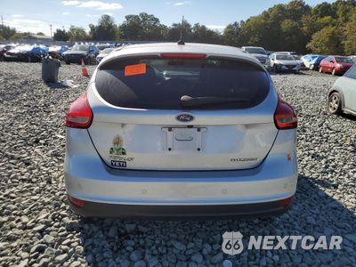 Zdjęcie 6 z 14 samochodu: 2017 FORD FOCUS TITANIUM VIN:1FADP3N26HL320464 - miniatura