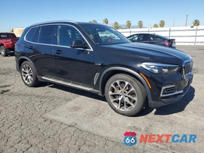 Czwarte zdjęcie samochodu z boku: 2023 BMW X5 XDRIVE45E VIN:5UXTA6C03P9N92460 - miniatura