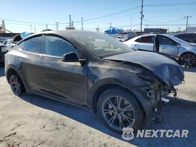 Czwarte zdjęcie samochodu z boku: 2024 TESLA Y VIN:7SAYGDEE2RF061958 - miniatura