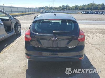 Zdjęcie 6 z 12 samochodu: 2013 FORD FOCUS TITANIUM VIN:1FADP3N22DL116433 - miniatura