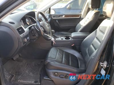 Zdjęcie 7 z 12 samochodu: 2014 VOLKSWAGEN TOUAREG V6 TDI VIN:WVGEP9BP9ED008934 - miniatura