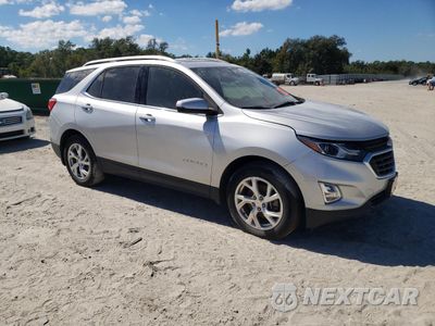 Czwarte zdjęcie samochodu z boku: 2018 CHEVROLET EQUINOX LT VIN:3GNAXKEX8JS529487 - miniatura