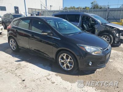 Czwarte zdjęcie samochodu z boku: 2013 FORD FOCUS TITANIUM VIN:1FADP3N22DL116433 - miniatura