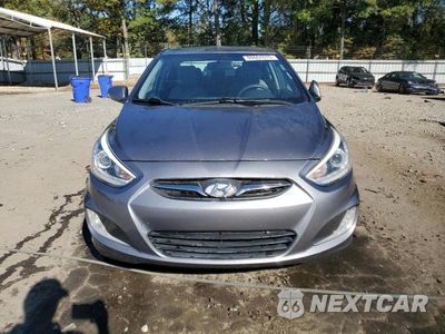 Piąte zdjęcie samochodu w środku: 2014 HYUNDAI ACCENT GLS VIN:KMHCU4AE9EU622563 - miniatura