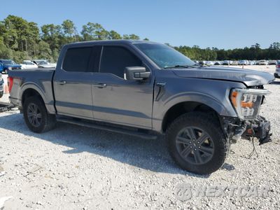Czwarte zdjęcie samochodu z boku: 2021 FORD F150 SUPERCREW VIN:1FTFW1E87MFB91366 - miniatura