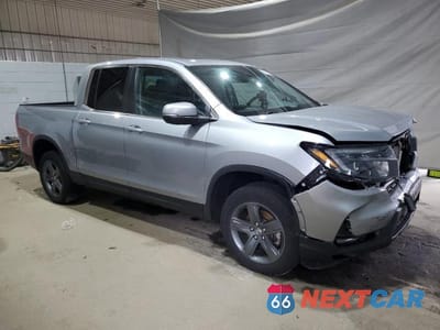 Czwarte zdjęcie samochodu z boku: 2023 HONDA RIDGELINE RTL VIN:5FPYK3F58PB024325 - miniatura