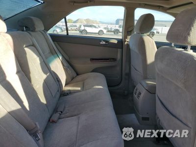 Zdjęcie 10 z 12 samochodu: 2002 TOYOTA CAMRY LE VIN:JTDBF30KX20057402 - miniatura