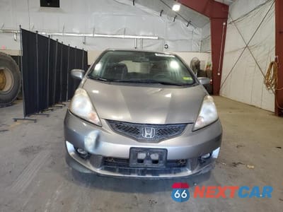 Piąte zdjęcie samochodu w środku: 2010 HONDA FIT SPORT VIN:JHMGE8H49AC001975 - miniatura