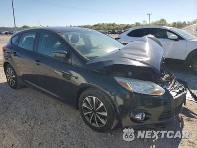 Czwarte zdjęcie samochodu z boku: 2012 FORD FOCUS SE VIN:1FAHP3K29CL299429 - miniatura