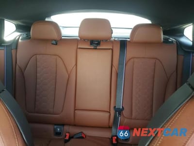 Zdjęcie 10 z 13 samochodu: 2023 BMW X4 M VIN:5YM23EC06P9P53473 - miniatura