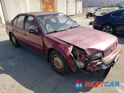 Czwarte zdjęcie samochodu z boku: 1994 NISSAN MAXIMA SE VIN:JN1EJ01F8RT500699 - miniatura