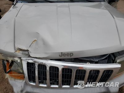 Zdjęcie 12 z 13 samochodu: 2000 JEEP GRAND CHEROKEE LAREDO VIN:1J4GW48S1YC407632 - miniatura