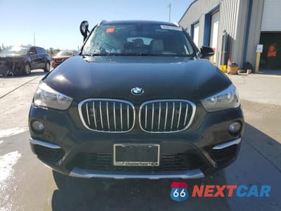 Piąte zdjęcie samochodu w środku: 2018 BMW X1 XDRIVE28I VIN:WBXHT3C34J5K32030 - miniatura