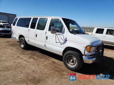 Czwarte zdjęcie samochodu z boku: 2000 FORD ECONOLINE E350 SUPER DUTY WAGON VIN:1FBSS31S9YHA60154 - miniatura