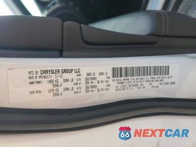 Zdjęcie 14 z 16 samochodu: 2014 JEEP GRAND CHEROKEE SUMMIT VIN:1C4RJFJT8EC346884 - miniatura