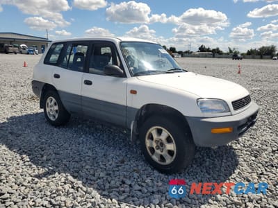 Czwarte zdjęcie samochodu z boku: 1997 TOYOTA RAV4 VIN:JT3HP10V3V7038499 - miniatura