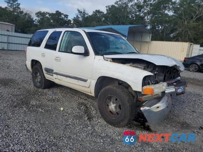 Czwarte zdjęcie samochodu z boku: 2003 GMC YUKON VIN:1GKEC13Z03R143547 - miniatura