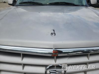 Zdjęcie 11 z 13 samochodu: 2005 CADILLAC ESCALADE EXT VIN:3GYEK62N55G137587 - miniatura