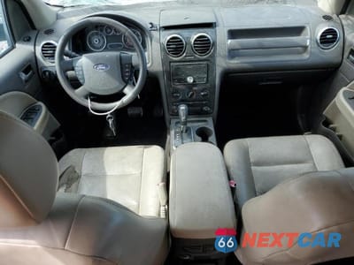 Zdjęcie 8 z 13 samochodu: 2009 FORD TAURUS X SEL VIN:1FMDK02W29GA03382 - miniatura