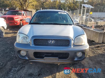 Piąte zdjęcie samochodu w środku: 2004 HYUNDAI SANTA FE GLS VIN:KM8SC13D44U691192 - miniatura