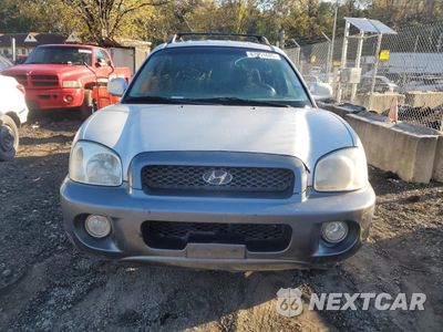 Piąte zdjęcie samochodu w środku: 2004 HYUNDAI SANTA FE GLS VIN:KM8SC13D44U691192 - miniatura
