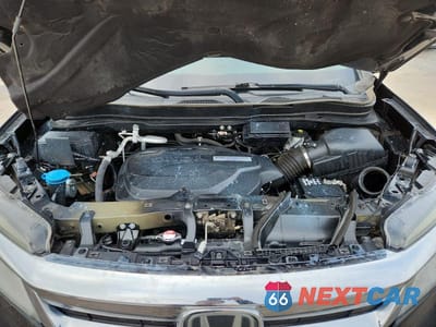 Zdjęcie 12 z 14 samochodu: 2019 HONDA PILOT TOURING AWD 8-PASS VIN:5FNYF6H96KB019549 - miniatura