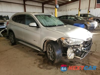 Czwarte zdjęcie samochodu z boku: 2017 BMW X1 XDRIVE28I VIN:WBXHT3C38H5F79633 - miniatura
