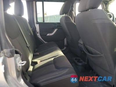 Zdjęcie 11 z 13 samochodu: 2014 JEEP WRANGLER UNLIMITED SAHARA VIN:1C4BJWEG0EL233817 - miniatura