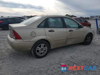 Trzecie zdjęcie samochodu z tyłu: 2002 FORD FOCUS SE VIN:1FAFP34P22W261327 - miniatura
