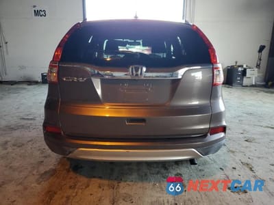 Zdjęcie 6 z 11 samochodu: 2015 HONDA CR-V EXL VIN:2HKRM3H76FH550488 - miniatura