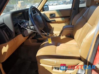 Zdjęcie 7 z 13 samochodu: 1998 JEEP CHEROKEE LIMITED VIN:1J4FJ78S8WL195644 - miniatura
