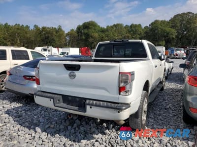 Trzecie zdjęcie samochodu z tyłu: 2017 NISSAN TITAN XD SL VIN:1N6BA1F29HN517832 - miniatura
